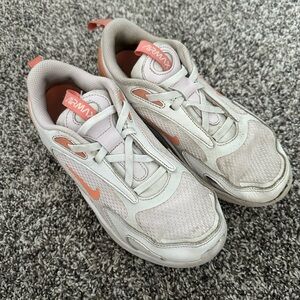 Nike Women's White Sneakers with Coral Swoosh